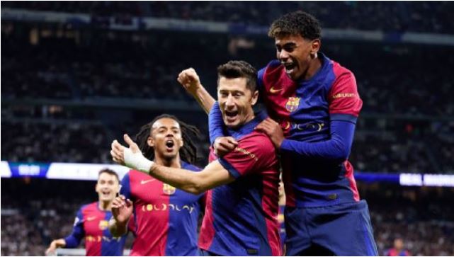 Robert Lewandowski scored twice to punish Real Madrid as Barcelona routed their rivals 4-0.